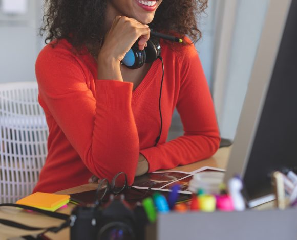 Black female graphic designer at computer | Digital Media Design
