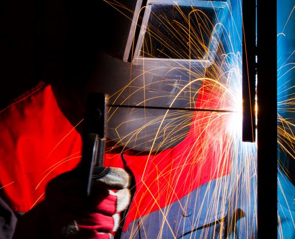 Welder in helmet