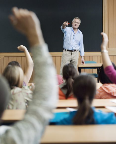 College professor in front of class