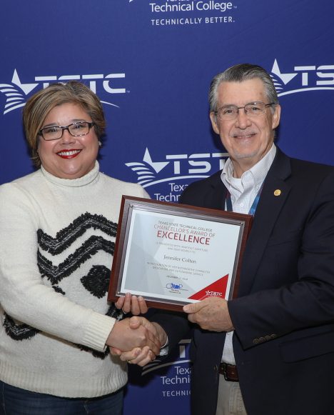 Hispanic female employee with the chancellor