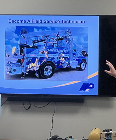Waukesha-Pearce Industries representatives Lauren Schielack, left, and Cris Perez recently visited TSTC’s Fort Bend County campus to connect with Diesel Equipment Technology students.