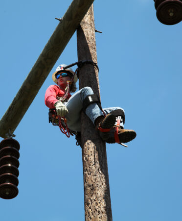 TSTC Electrical Lineworker and Management Technology student Christopher Winton demonstrates the climbing skills that he has learned in the campus’ pole yard while training.