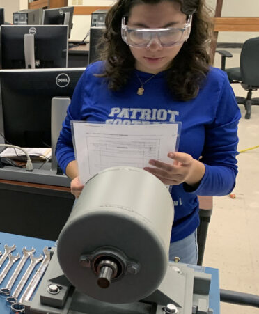 TSTC Mechatronics Technology student Seihda Valverde works on a mechanical drive as part of a performance assessment administered by Toyota Motor Manufacturing, Texas test.