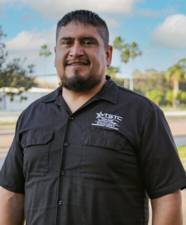 TSTC Auto Collision and Management Technology program director Jose Vasquez is a coach and mentor for the Los Fresnos Falcons Little League. January is National Mentoring Month.