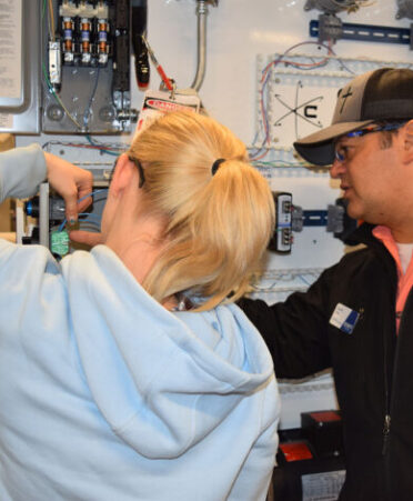 TSTC Industrial Systems instructor Daniel Diaz (right) works to make sure that students are prepared for a career while also taking the time to ensure that they have success in their lives.