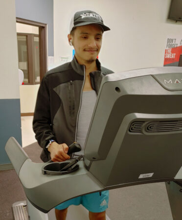 TSTC student Francisco Herrera begins his walking exercise on a treadmill, a heart-healthy activity, at TSTC’s Wellness and Recreation Center.