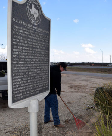 TSTC Wind Energy Technology student Cameron Dirickson rakes the landscape at the site of the Women Airforce Service Pilots (WASP) historical marker in Sweetwater. Members of the Winds of Texas, TSTC’s club for Wind Energy Technology students, plan to continue community service projects in Sweetwater.