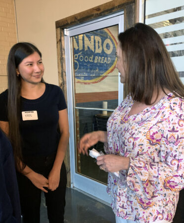 TSTC Dental Hygiene student Miranda Gonzalez (left) visits with Lillian Adame Nelson, a dentist at Los Ebanos Family Dentistry in Brownsville, at the recent dental hygienist networking event.