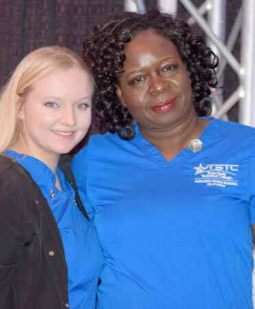 Madison Arredondo (left) and Jackline Onsarigo were among the TSTC Associate Degree in Nursing graduates honored during a pinning ceremony on Thursday, April 27.