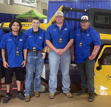 TSTC Automotive Technology students (from left) Ryan Rogers, Alejandro Soto, Richard Martin, Kohl Henry Clark and Juan Guerra serviced vehicles for people in need during this month’s CarFest in San Antonio.