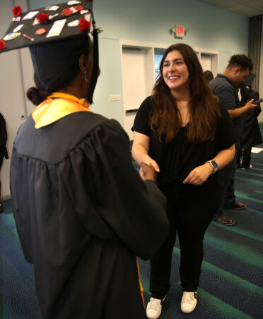 Belinda Palomino (right), TSTC’s Advocacy and Resource Center statewide lead, congratulates recent TSTC graduate Lorri DeJesus, who earned an Associate of Applied Science degree in Education and Training. DeJesus received support from the Advocacy and Resource Center during her time as a student.