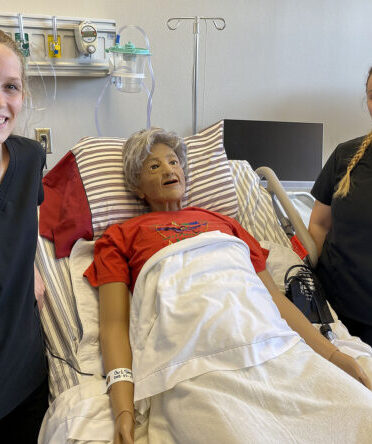 TSTC Vocational Nursing students Marla Mauzey (left) and Aleya Green, seen here with a medical training manikin, were inspired to become nurses for different reasons. They both said having passion to help others was a reason to begin the Nursing program at TSTC.