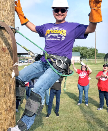 Alex Salinas, a higher education coordinator at San Benito High School, climbs a training utility pole at TSTC’s Electrical Lineworker and Management Technology program’s pole yard during TECHcelerate, a technical education conference recently held at TSTC’s Harlingen campus.