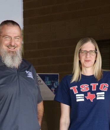 TSTC Automation and Controls Technology instructor Troy Powledge and senior enrollment coach Charla Foster returned to TSTC to help educate future generations. (Photo courtesy of TSTC.)