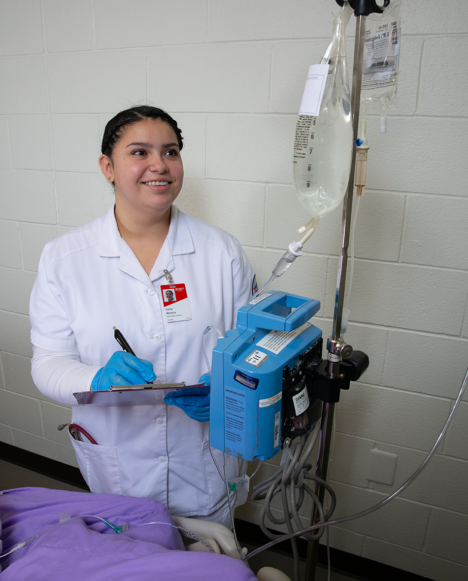 Harlingen nursing student practicing hands-on training in the simulation lab.