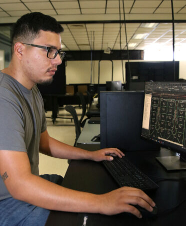TSTC Drafting and Design student Luis Escobedo works on a class assignment using the architectural design program Civil 3D during a recent lab session.
