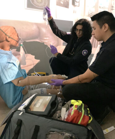 TSTC Emergency Medical Services students Isaiah Valencia (left) and Steven Rodriguez perform an assessment on a medical manikin in the Immersive Interactive EMS lab.