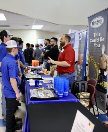 An employer from Kirby-Smith Machinery tells some of Texas State Technical College’s Diesel Equipment Technology students about what his company offers at the college’s Industry Job Fair held Tuesday, Oct. 3, at the Marshall campus.