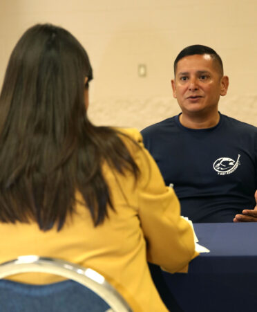 Mark Lozano (right), a TSTC Electrical Lineworker and Management Technology student, discusses his job qualifications with Anna Putegnat, talent acquisition and staffing specialist for the Brownsville Public Utilities Board, during a recent TSTC Career Services Interview Practicum.