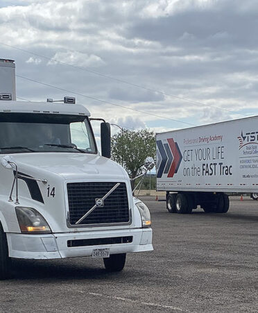 Two trucks in a parking lot