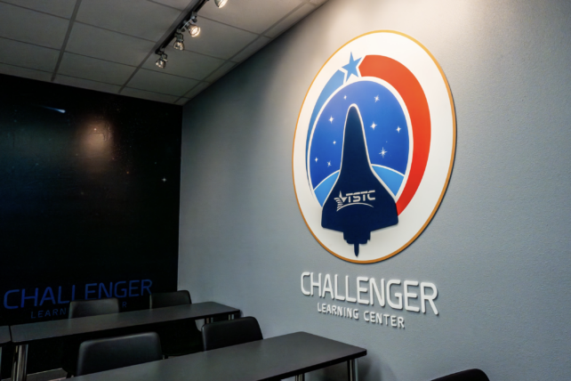 Challenger Learning Center logo on wall