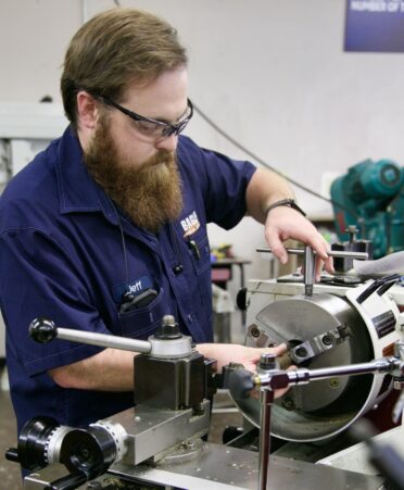 TSTC student Jeffry Goodson balances his time between the Precision Machining Technology program and working for a local tractor and equipment company. (Photo courtesy of TSTC.)