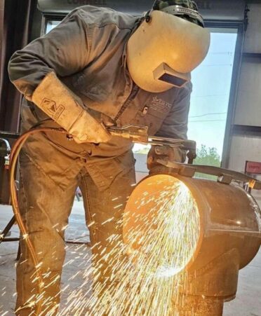 A TSTC Welding Technology student practices constructing a barbecue pit in preparation for the 2024 SkillsUSA Texas Postsecondary Leadership and Skills Conference. (Photo courtesy of TSTC.)