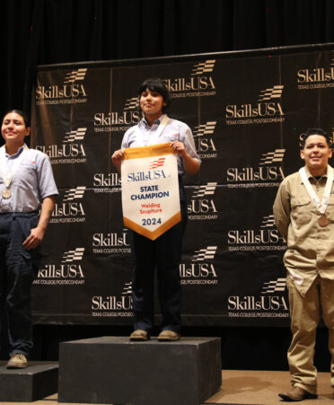 Allison Agundiz (center), a TSTC Auto Collision and Management Technology student, earned a gold medal in Welding Sculpture at the recent SkillsUSA State Leadership and Skills Conference in Houston.