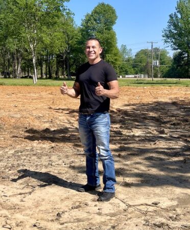 TSTC student Henry Wells is contractor for his own business, Wells Enterprises Unlimited LLC. The lot he is standing on is the future site of one of the company’s newest homes. (Photo courtesy of Henry Wells.)