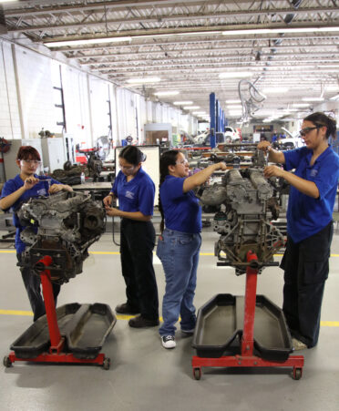 TSTC Automotive Technology students (left to right) Crystal Santoyo and Joselyn Ramirez use tools to remove a high-pressure fuel pump, while Dulce Cruz and Beatriz Loa use tools to remove a valve cover, during a recent lab session.