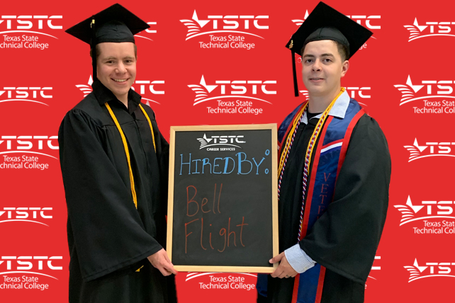 TSTC graduate posing in cap & gown holding a chalkboard showcasing their new employer.