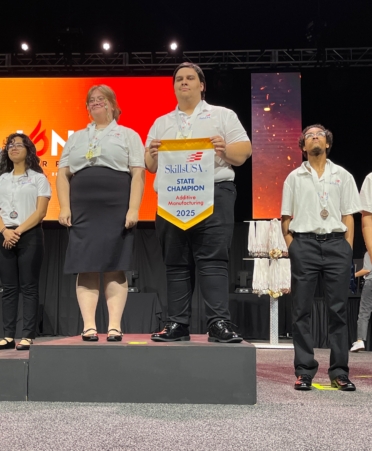 TSTC Drafting and Design students Autumn Sereno and Jorge Martinez (center) took first place in Additive Manufacturing at the 2025 SkillsUSA Texas Postsecondary Leadership and Skills Conference. (Photo courtesy of TSTC.)