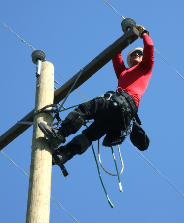 Diego Viera, an Electrical Lineworker and Management Technology student at TSTC’s Harlingen campus, secures a knot on an insulator to stabilize the line and prevent it from shifting during a recent lab session.