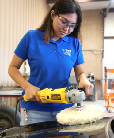 Jessica Reyna, a TSTC Auto Collision and Management Technology student at TSTC’s Harlingen campus, uses a car buffer on a 2016 Mini Cooper during a recent lab session.