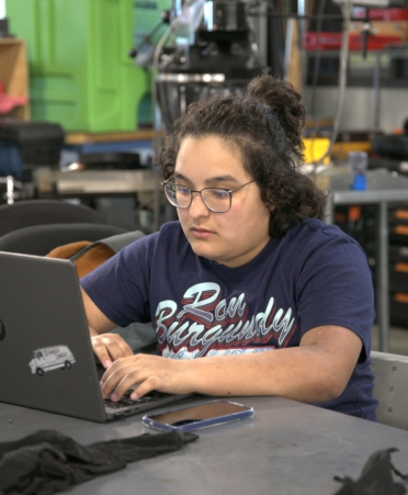 TSTC Precision Machining Technology student Carley Lopez works on machine programming during a recent lab session at TSTC’s Williamson County campus. (Photo courtesy of TSTC.)