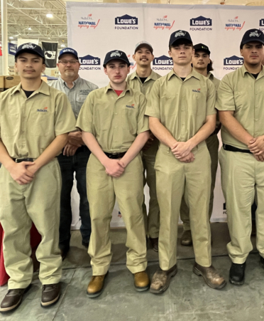 Photo caption: Belton High School students (front row, from left) Angel Armas, Dillion Calice, James Clark and Joey Sandoval participate in the SkillsUSA National Signing Day on Tuesday, May 6, at Lowe's in Temple. In the back row (from left) are Texas State Technical College Building Construction Technology instructor William Morelock, TSTC student Chad Robertson, TSTC Electrical Construction graduate Victor Flores and TSTC Electrical Construction instructor Dan Mayberry. (Photo courtesy of TSTC.)