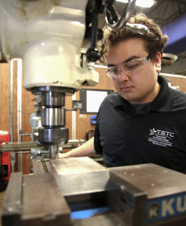 Giovanni Guerra, a Precision Machining Technology student at TSTC’s Harlingen campus, squares an aluminum block using a mill machine during a recent lab session.