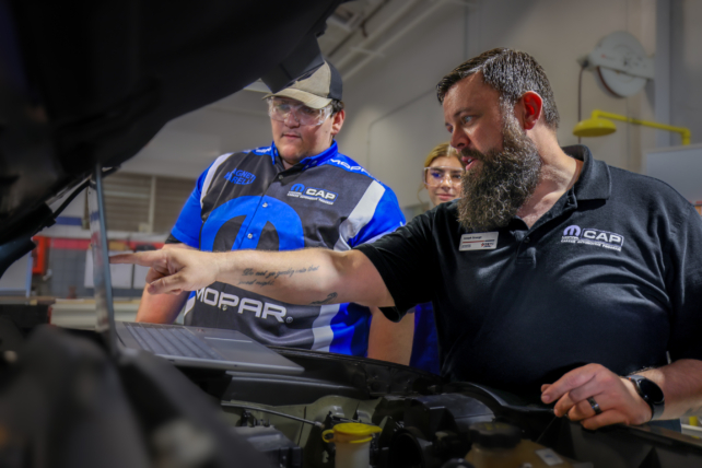 Photo caption: Joseph Strange, right, a Mopar Career Automotive Program instructor at Texas State Technical College’s Waco campus, works with students during a recent lab session on alternators. (Photo courtesy of TSTC.)
