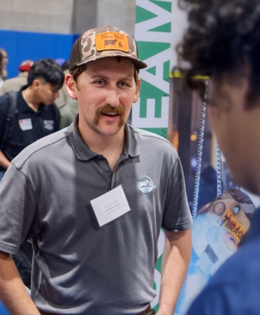 IMG_2938 Photo caption: Reed Littleton works in facilities maintenance at Blue Bell Creameries in Brenham and is a graduate of Texas State Technical College’s Diesel Equipment program. He represented his company at the Industry Job Fair held this week at the Waco campus. (Photo courtesy of TSTC.)