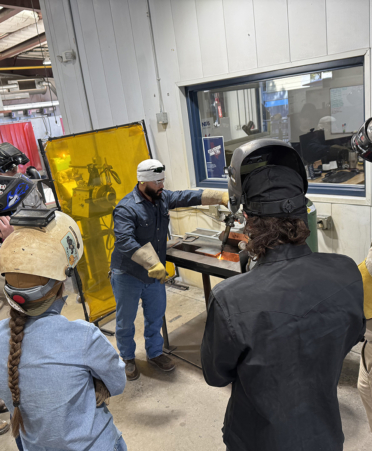 Students in a welding lab