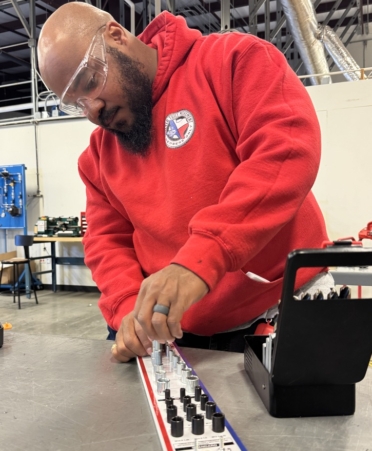Kristofeur Eldridge is an Industrial Maintenance student at Texas State Technical College’s North Texas campus and interns for Oncor Electric Delivery in Lancaster in the waste management division. (Photo courtesy of TSTC.)