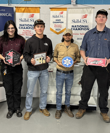 ETT plaque six people in a line