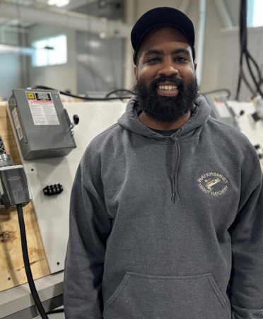 fred hawkins man in gray sweatshirt in a lab