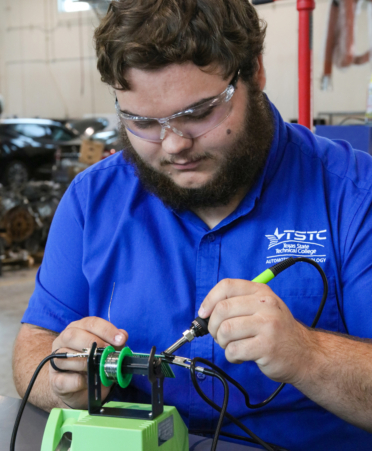 Huntsville resident Ethan Biater, an Automotive student at Texas State Technical College’s Fort Bend County campus, soldiers a part on a circuit board during a recent lab session. He will compete in the SkillsUSA Texas Postsecondary Leadership and Skills Conference being held April 8-11 in Corpus Christi.