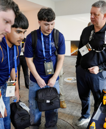 Texas State Technical College HVAC students in Fort Bend County (from left) Kory Walther, Edwin Padron and Xavier Gonzalez learn about Fluke’s Reliability Lab equipment from Frederic Baudart, the product program manager at Fluke Corp.