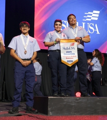 group of people on podium
