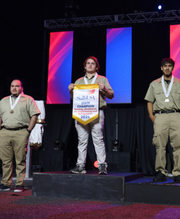 Edward Wilds (middle) received the gold medal for Heating, Ventilation, Air Conditioning and Refrigeration at the recent 2026 SkillsUSA Texas Postsecondary Leadership and Skills Conference in Corpus Christi. (Photo courtesy of TSTC.)