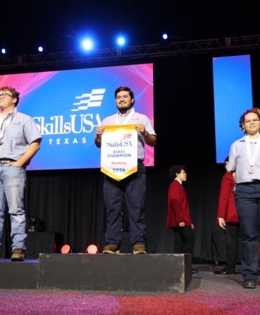 Jesus Padron Jr. (center), a Plumbing and Pipefitting student at Texas State Technical College, won the gold medal in the Plumbing contest at the recent 2026 SkillsUSA Texas Postsecondary Leadership and Skills Conference in Corpus Christi.