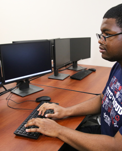 student working on a computer