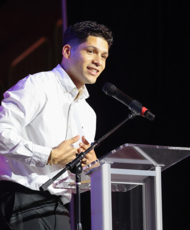 Photo caption: Adrian Naciaceno, an aviation maintenance instructor at Texas State Technical College’s Harlingen campus, spoke at the opening ceremony for the 2026 SkillsUSA Texas Leadership and Skills Conference for high school and college students on Wednesday, April 8, at Hilliard Arena in Corpus Christi. (Photo courtesy of TSTC.)